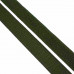 Зеленая лента липучка отображена крупным планом.