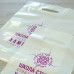 Пакет ПВД белый для одежды с вырубной неукрепленной ручкой, донной складкой и логотипом